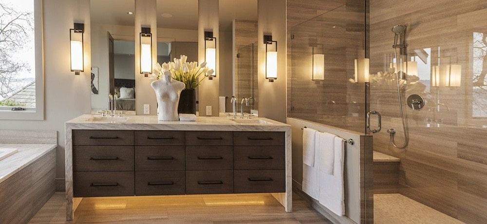 A warmly lit staged bathroom renovation.