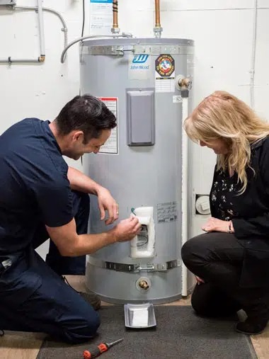 Technician testing a customer's water heater.